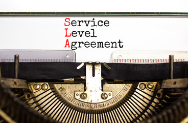 SLA service level agreement symbol. Concept words SLA service level agreement typed on beautiful...