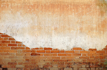 Brick wall background of an old wooden house, a popular check-in spot in Chiang Khan District, Loei Province, upper northeastern region of Thailand.