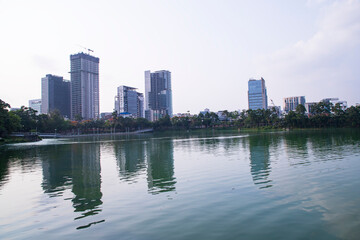 Fototapeta premium Beautiful Skylark landscape view of Hatirjheel lake with blue sky in Dhaka-Bangladdesh