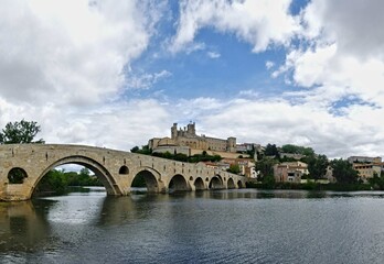 B&eacute;ziers, May 2024: Visit the magnificent city of B&eacute;ziers in Occitanie. Street photos - View of Saint-Nazaire and Saint-Celsus cathedrals 
With the Pont Vieux