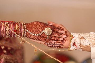 Indian Bride and Groom holding hand ritual, Hindu Wedding Concept, Bride and Groom Wedding Closeup	