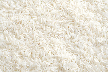 Rice background of grain rice texture.Close up of white long grain rice texture background.