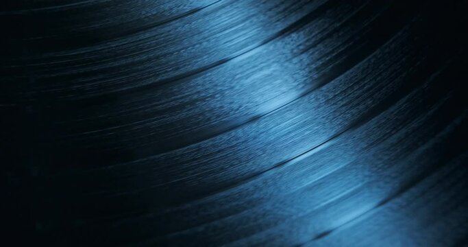 Blue Vinyl record rotating, close view
