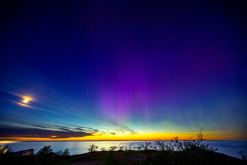 Northern light dancing over the Baltic sea at island of Gotland.