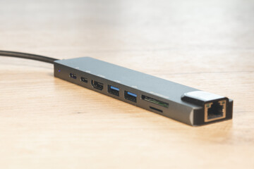 Laptop USB Type-C adapter with different connectors for connecting devices.