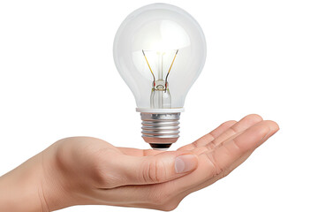 Idea light bulb in hand isolated on black background.