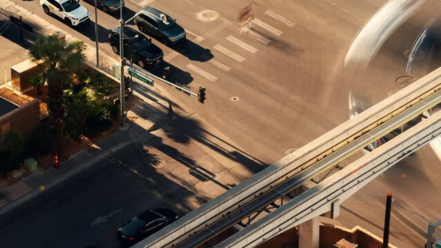 Sunset time-lapse of cars crossing a busy intersection in Las Vegas city, Nevada, USA