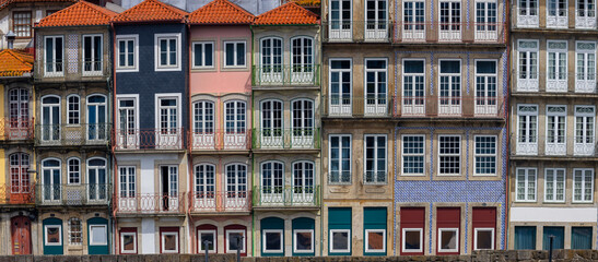 Panoramic view of UNESCO world heritage site Porto city in Portugal, row of traditional colorful...