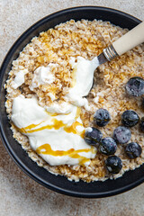 oatmeal with berries healthy breakfast oat porridge fresh cooking appetizer meal food snack on the table copy space food background rustic top view