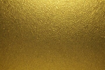 Naklejka premium Shimmering Gold Surface Texture Background