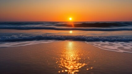 Golden sunset sky reflecting in the water, close-up view from the shore. Setting sun. Waves texture. relax and resort