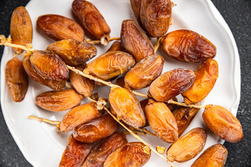 date branch dried fruit fresh appetizer food snack on the table copy space food background rustic top view