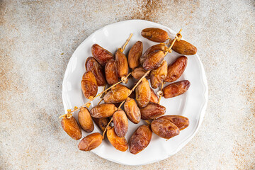 date branch dried fruit fresh appetizer food snack on the table copy space food background rustic top view