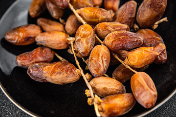 date branch dried fruit fresh appetizer food snack on the table copy space food background rustic top view