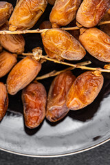 date branch dried fruit fresh appetizer food snack on the table copy space food background rustic top view