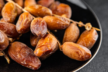 date branch dried fruit fresh appetizer food snack on the table copy space food background rustic top view