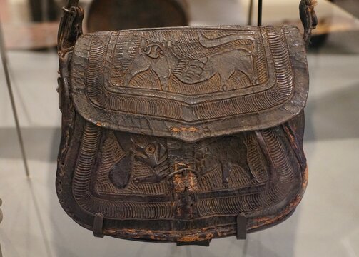 San Antonio, Texas, U.S.A - April 9, 2024 - The leather hunting bag on display inside of the Alamo Exhibit