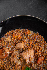 lentils with meat beef or pork fresh cooking appetizer meal food snack on the table copy space food background 