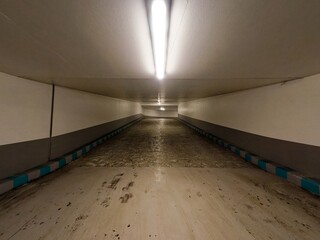 Ultrawide angle shot of a ramp in an  underground parking