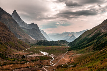 View of the valley to the east withe the Aiguille Noire de Peuterey from the climb towards the Limestone Pyramids