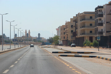 Obraz premium Transportation and traffic on highway in Hurghada city. City with street cars