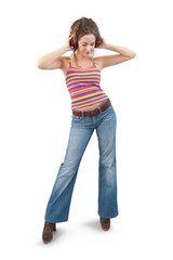 Joyful young woman who is listening to music through headphones, dancing, and singing while being isolated against a white background