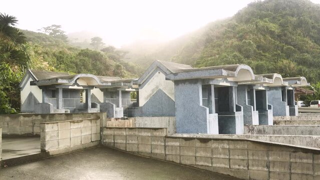 Typical Japanese Cemetery in Okinawa Islands, Japan. The peculiarly shaped Okinawan tombs known as kamekoubaka. The traditional Okinawan turtleback tomb. High quality 4k footage