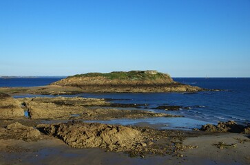 Be island at low tide in the bay of St Malo in Brittany in France, Europe