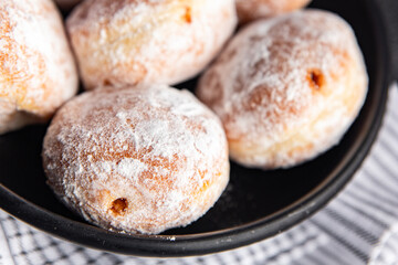 donut filled with powdered sugar
chocolate filling fresh appetizer meal food snack on the table copy space food background 