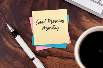 High angle view of adhesive note and text Good Morning Monday