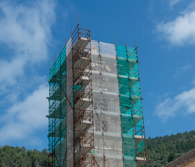 Scaffolding for the restoration of the bell tower of the church of Verigotti