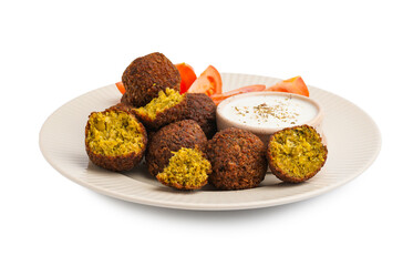 Plate with delicious falafel balls, sauce and tomatoes on white background
