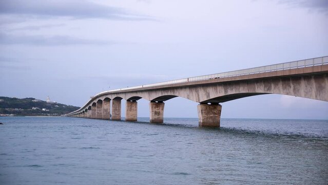 Kouri Big Bridge at sunset Okinawa Island, Japan. Dramatic weather. High quality 4k footage.