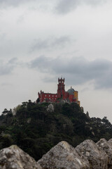 Obraz premium View of the Colorful Sintra Castle from the Moorish Castle in Sintra Portugal