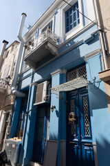 blue building in a small town in greece 