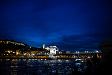 Night skyline in the Danube river with the chain bridge and Parliament building in Budapest, Hungary