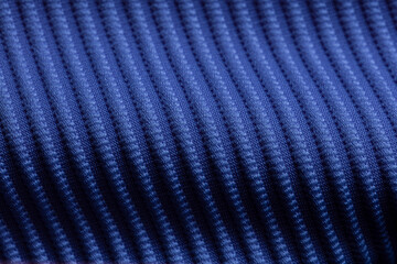 Closeup of blue corduroy cloth as patterned textured background