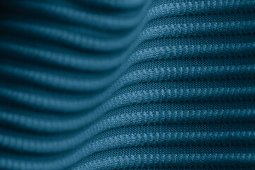 Closeup of blue corduroy cloth as patterned textured background