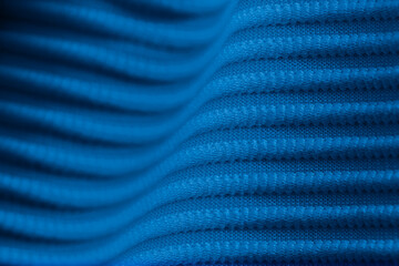 Closeup of blue corduroy cloth as patterned textured background
