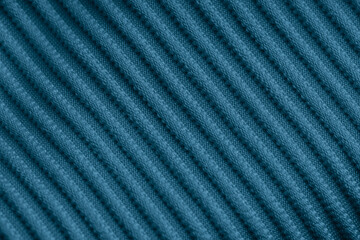 Closeup of blue corduroy cloth as patterned textured background