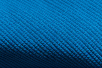 Closeup of blue corduroy cloth as patterned textured background