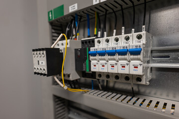 Circuit breakers and contactors in the switchboard.