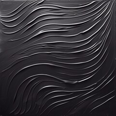 Detailed close-up of a black wavy texture creating an abstract design