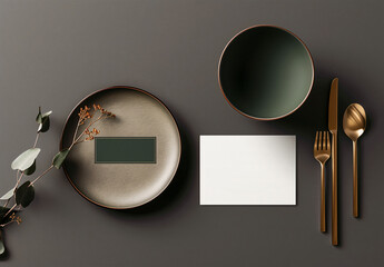 Traditional business card or poster mock-up showing a blank paper card next to a beautiful plate and bowl as well as golden cutlery on a dark gray background