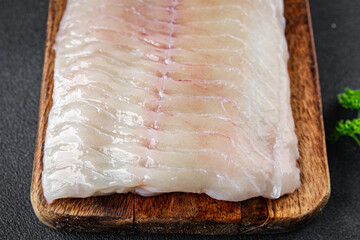 raw white fish fillet giant sea bass and filleting grouper fresh cooking appetizer meal food snack...