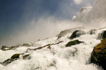 View of rocks and rapids at the edge of Niagara Falls