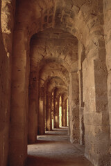 Archway in Roman colosseum in El Djem city - ancient Thysdrus, Tunisia