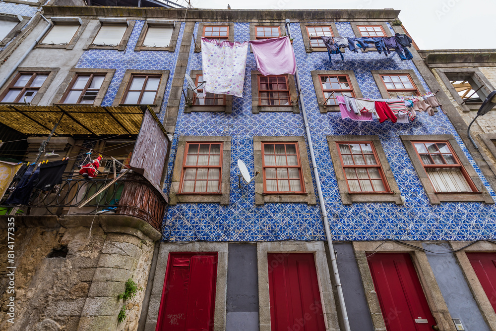 Sticker Old apartment building with Azulejo facades in Ribeira area of Porto, Portugal