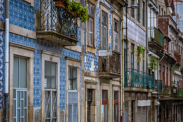 Fototapeta premium Houses with Azulejo tiled facades on Rua do Sol street in Porto city, Portugal