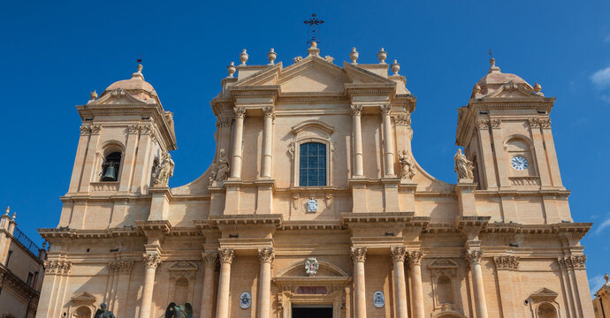Cathedral of Saint Nicholas of Myra and sculptures of Igor Mitoraj in Noto city in Province of Syracuse on the island of Sicily, Italy